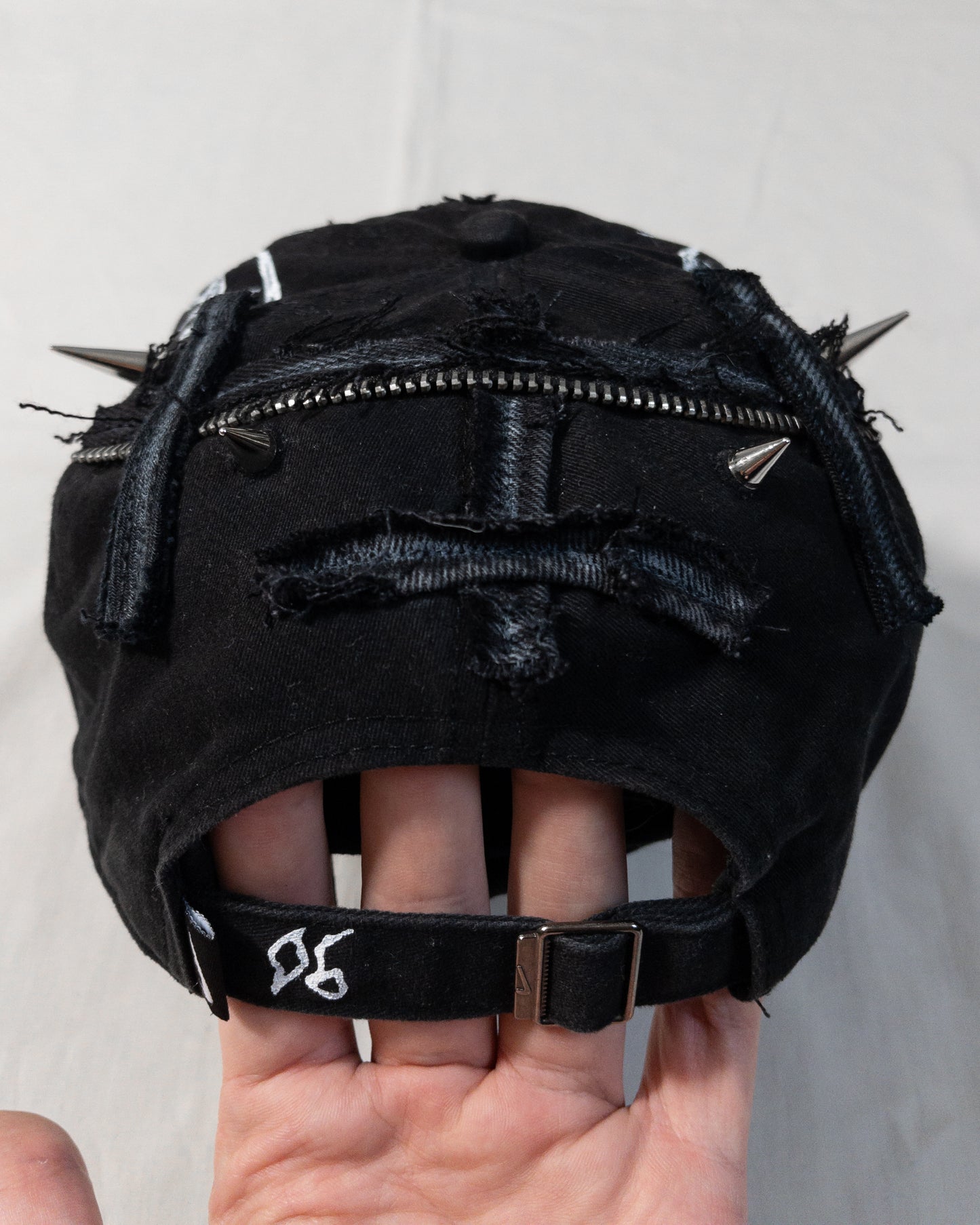 "crucified" cap