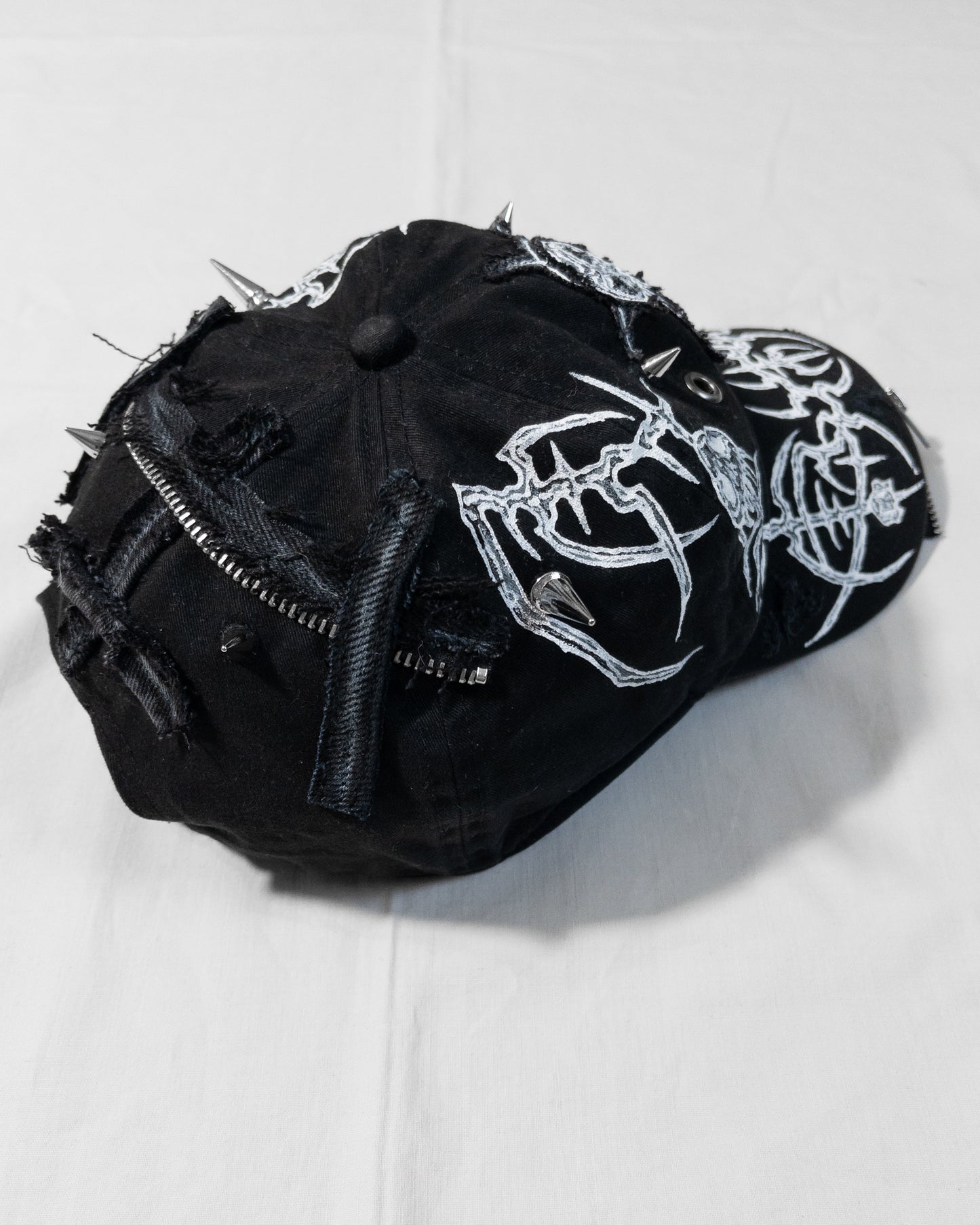 "crucified" cap