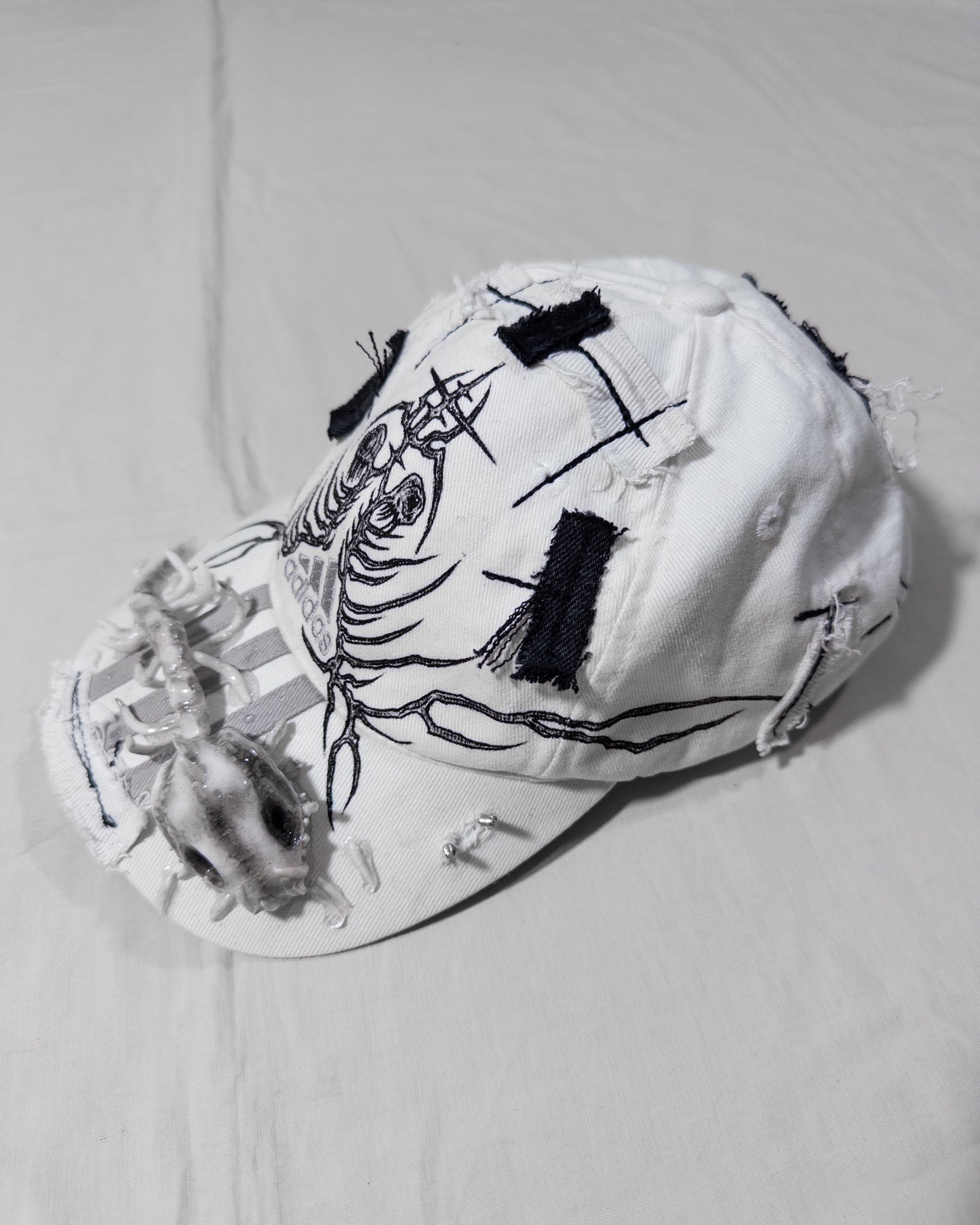 "metamorphosis" cap