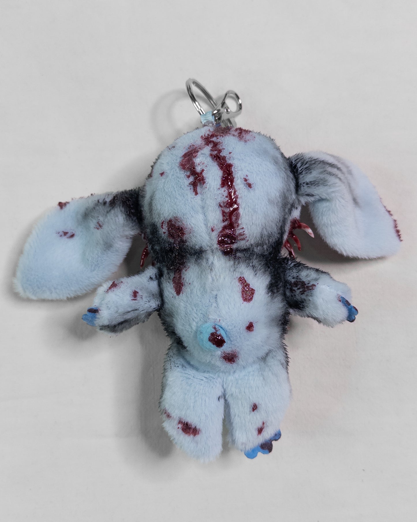 "forgiven alien" keychain