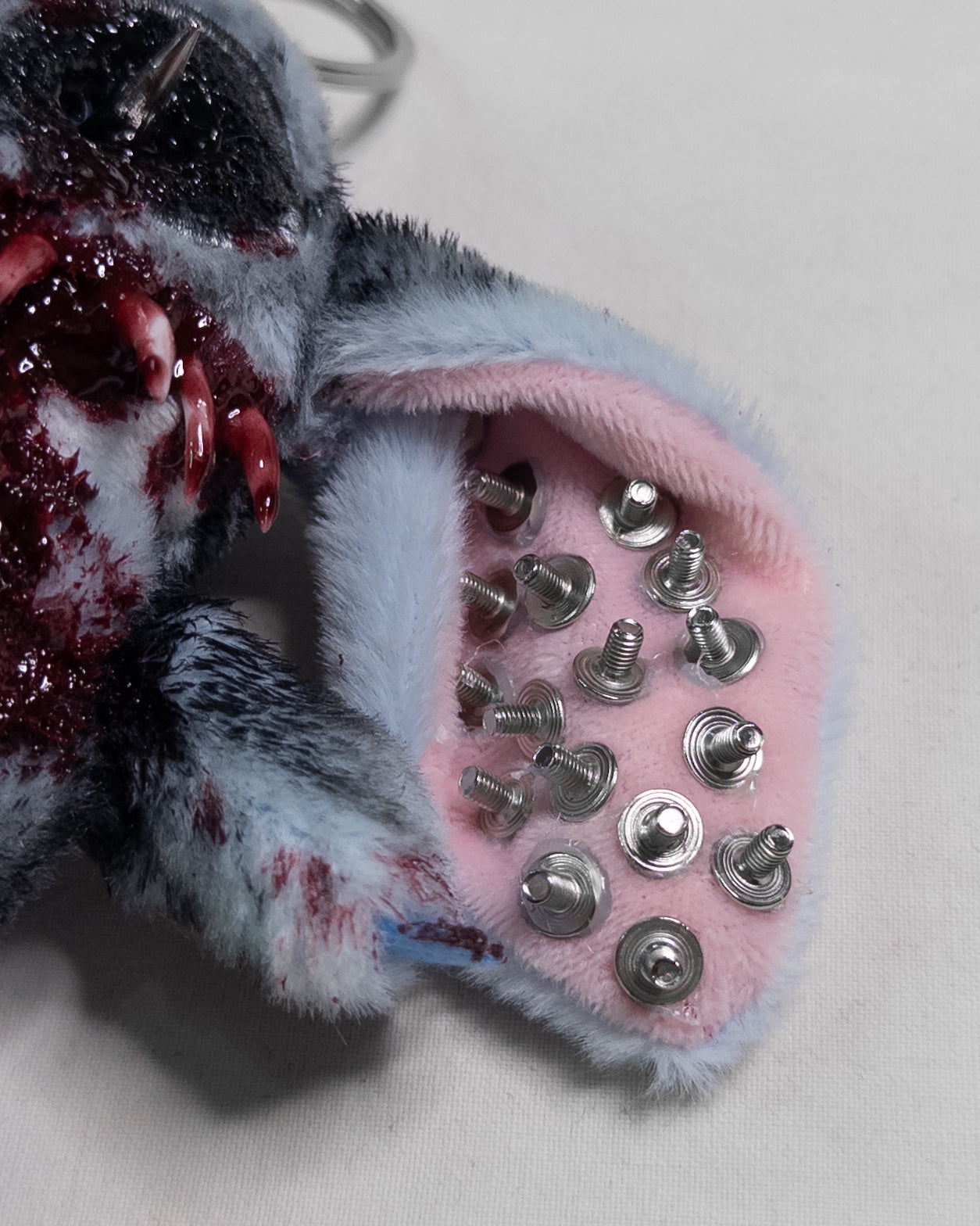 "forgiven alien" keychain