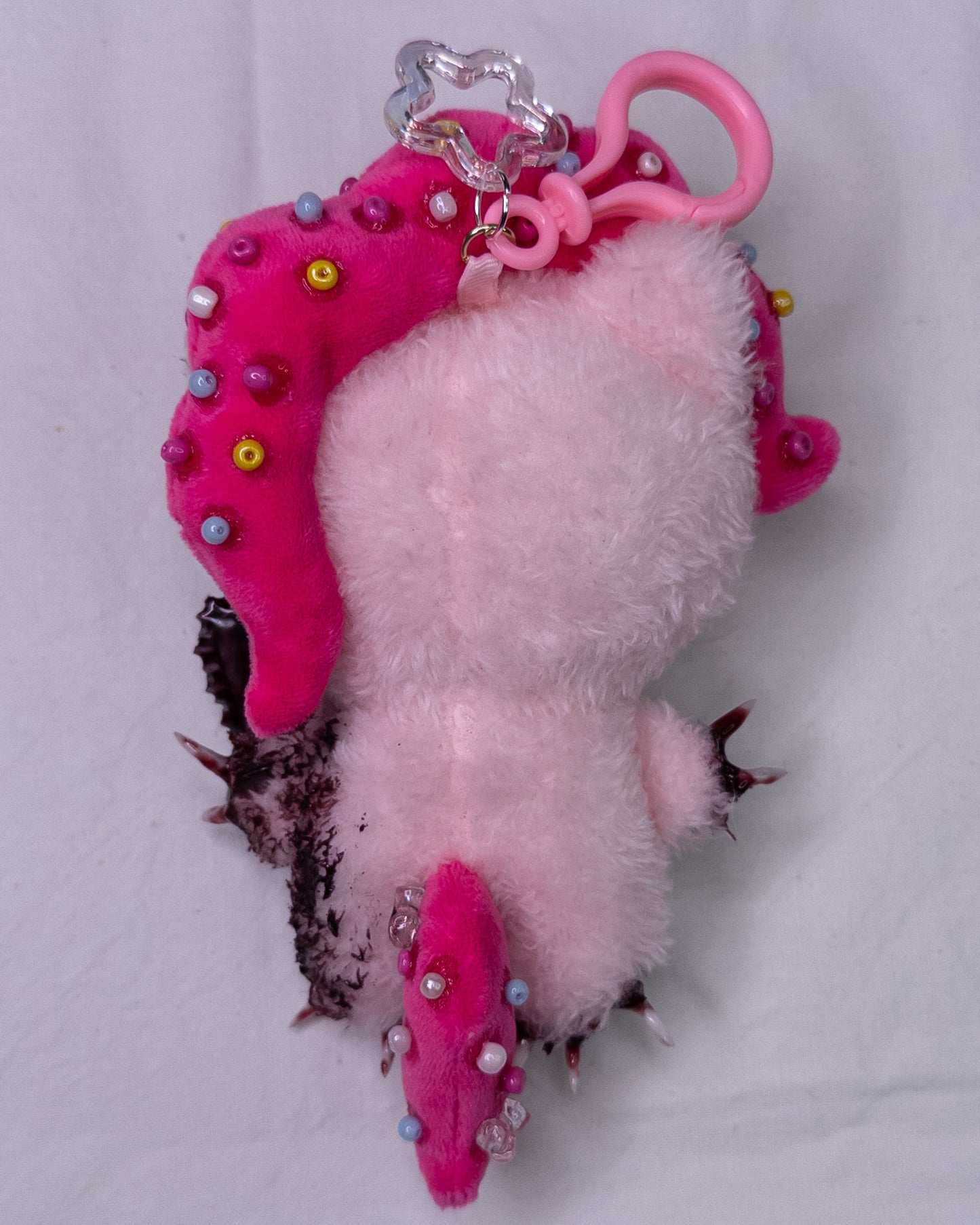 "torture" keychain