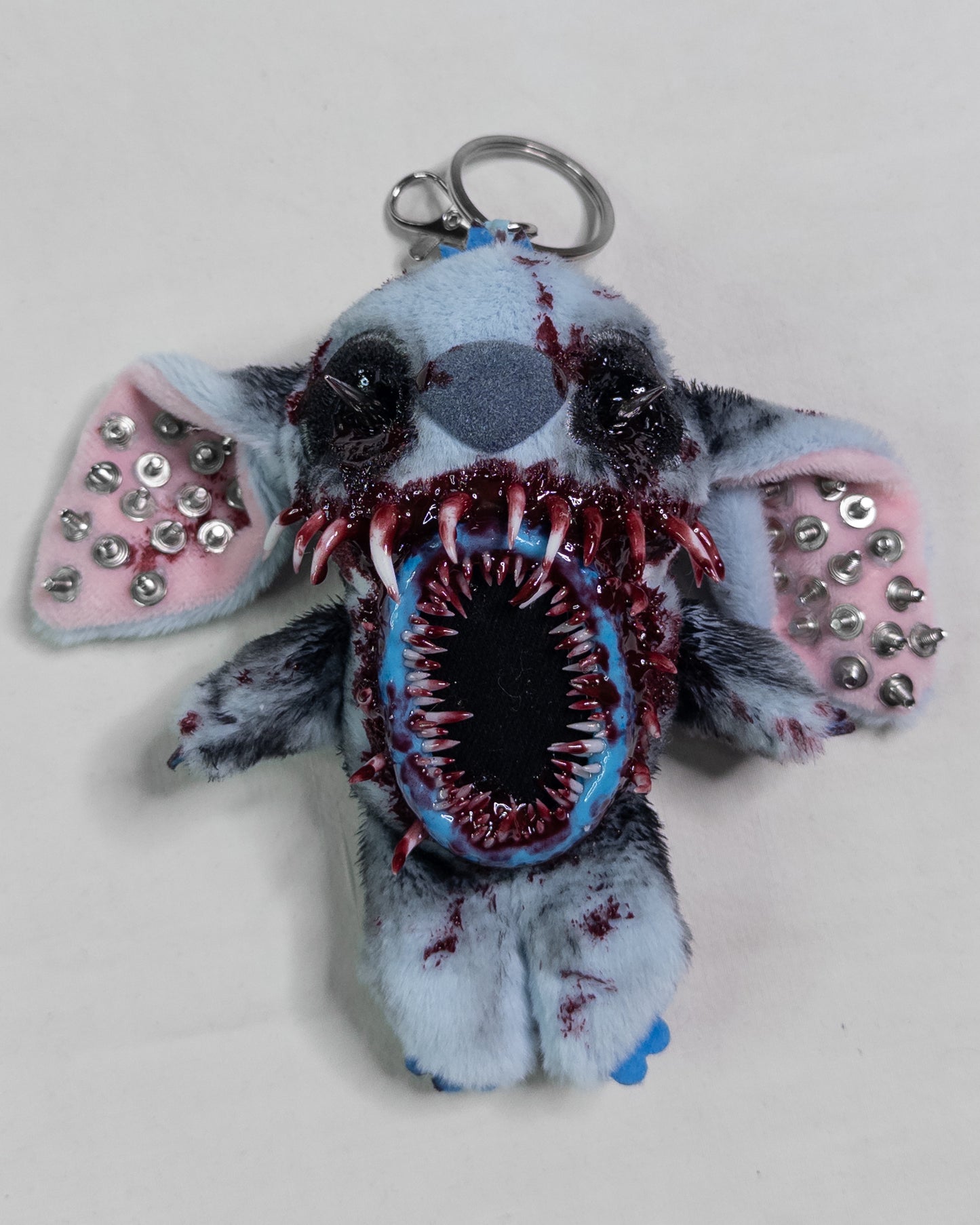 "forgiven alien" keychain