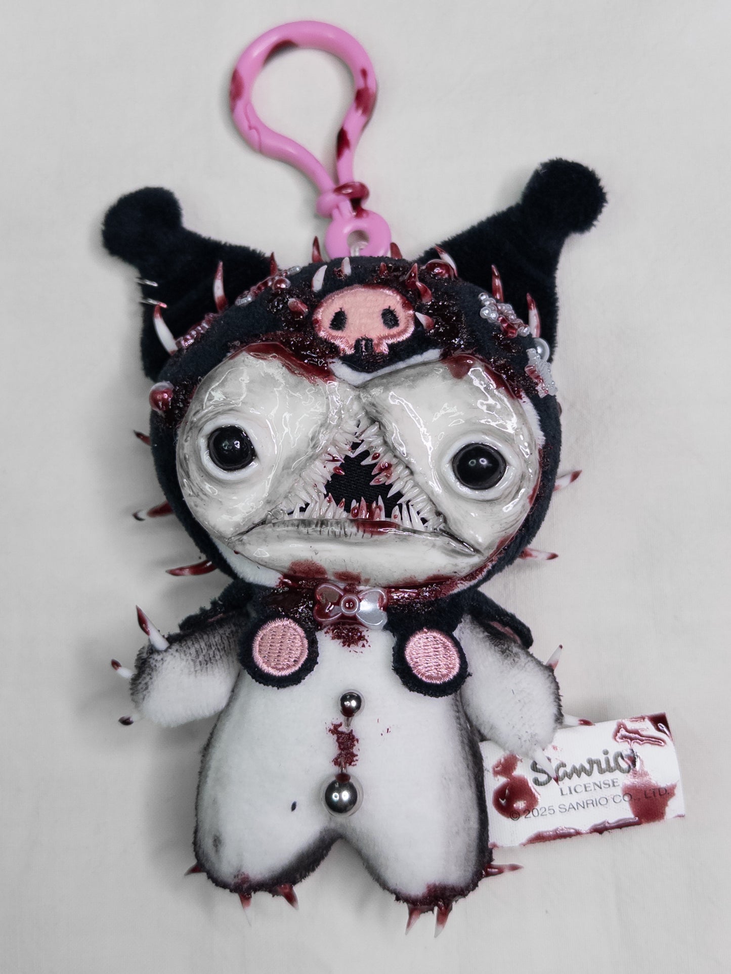 "pierced tummy" keychain