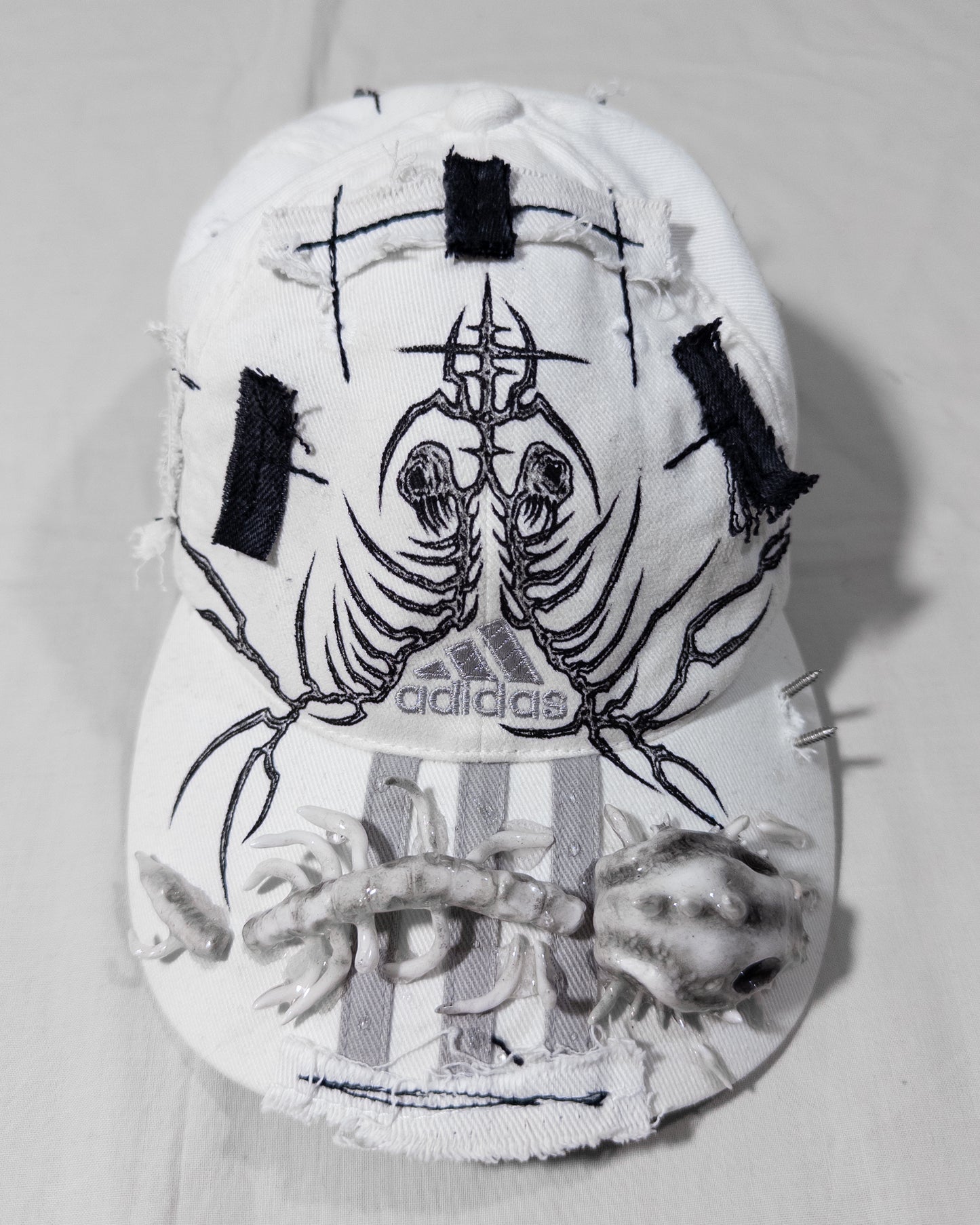 "metamorphosis" cap