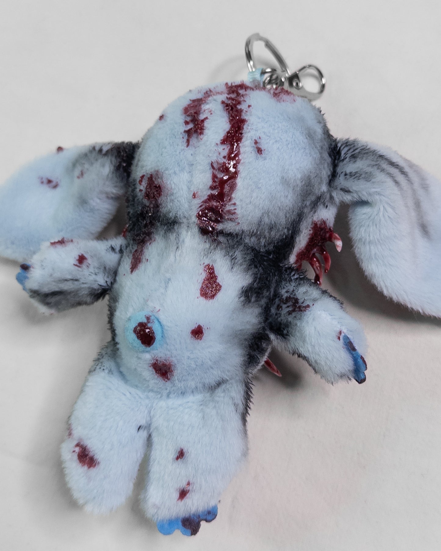 "forgiven alien" keychain